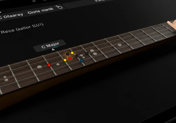 Virtual guitar showing finger placement for a chord on fretboard